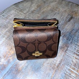 Coach signature print trifold wallet